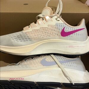New in box. Nike Women’s Running Shoes - Pale Pink & White